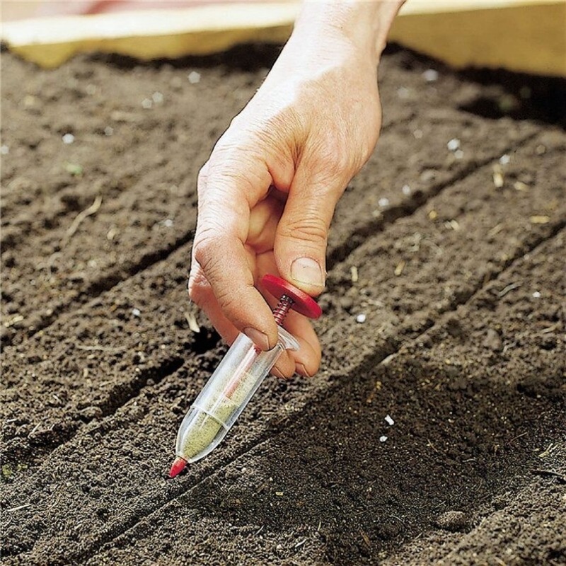 أداة بذر وتسميد يدوية صغيرة لل - مراجعة Fertilizer Dispenser وسعره